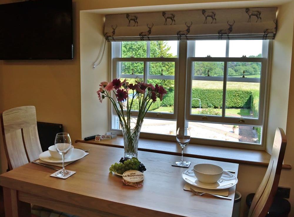 Inviting dining area with lovley views at Garth Studio, 
