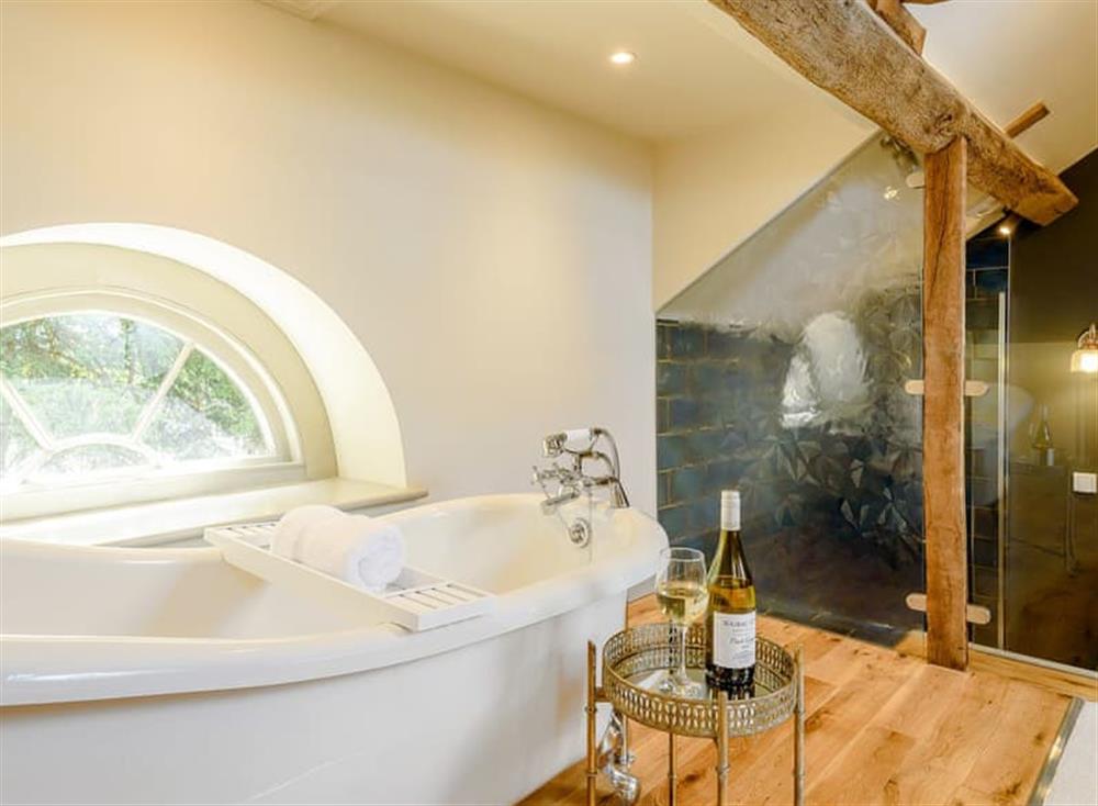 Relaxing roll top bath in the bedroom at The Clock Tower, 
