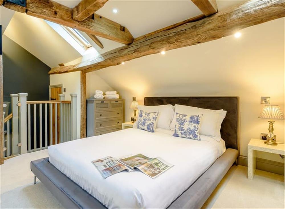 Stunning bedroom with beamed ceiling at The Clock Tower, 