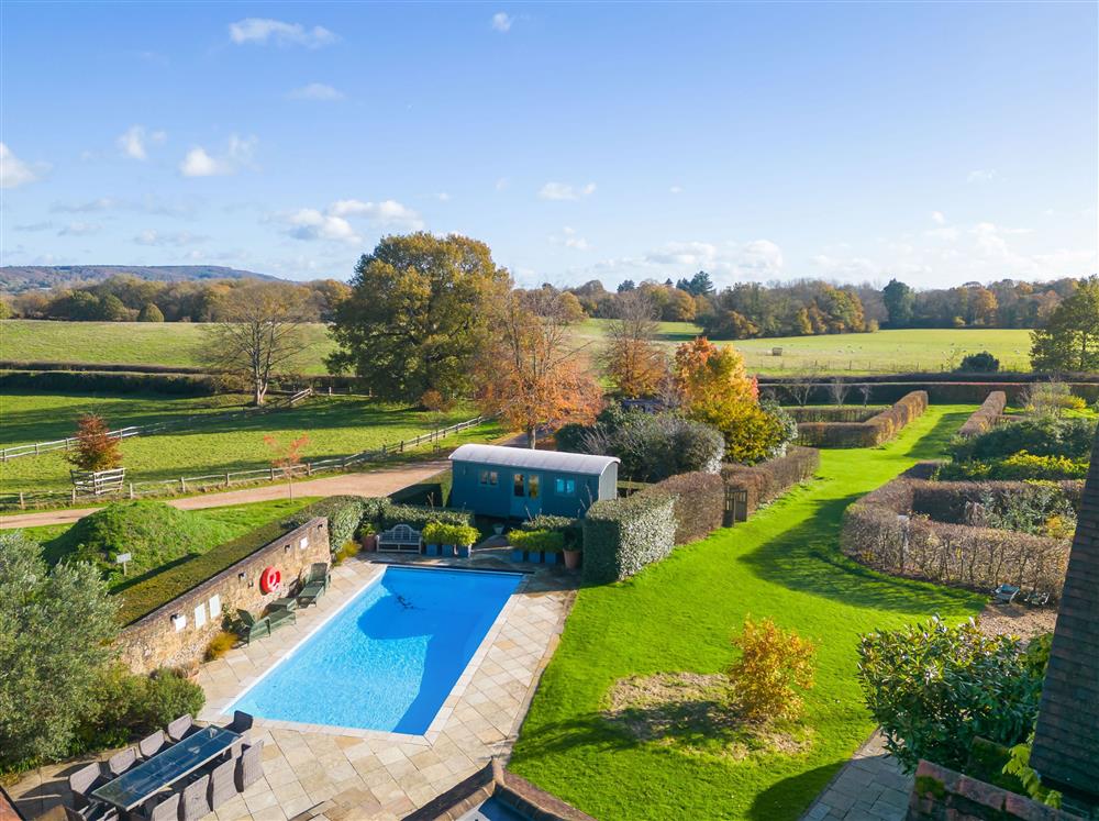 Aerial view of the pool house and outdoor pool