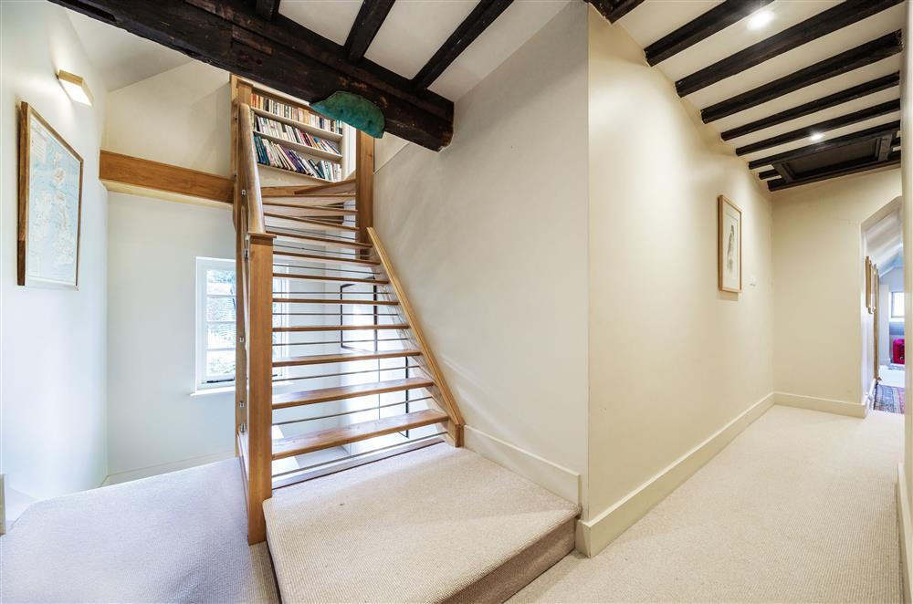 Stairs lead to the second floor, where The Loft room is located