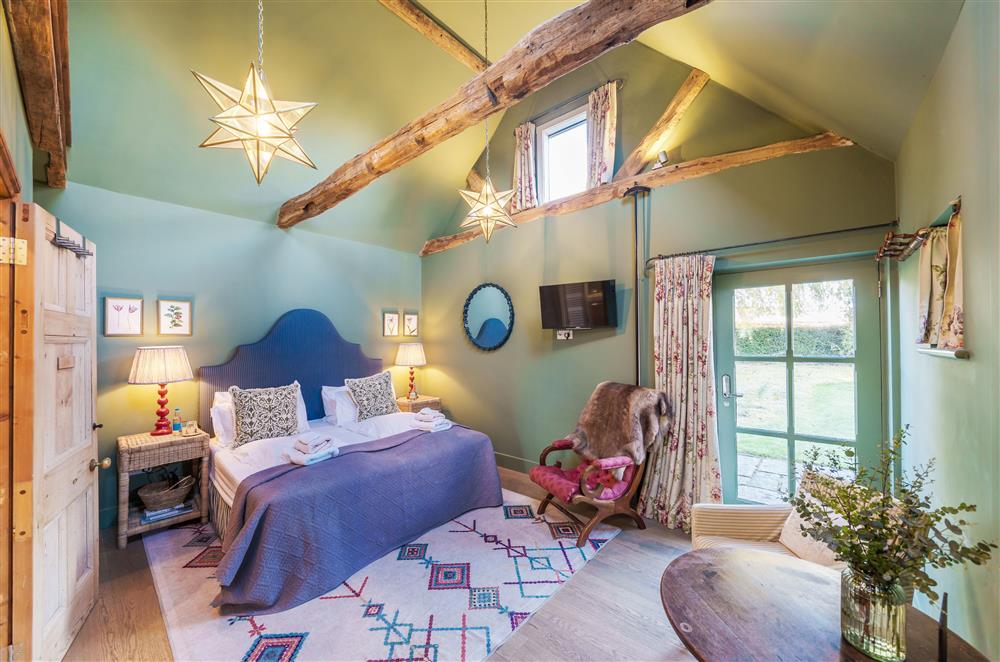 The Hayloft, with oak beams and tasteful furnishings