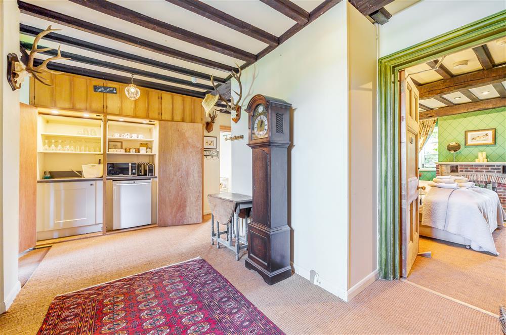 The ground floor hallway, with an enclosed kitchenette and coffee bar at Gate Street Farm House, Bramley, Guildford