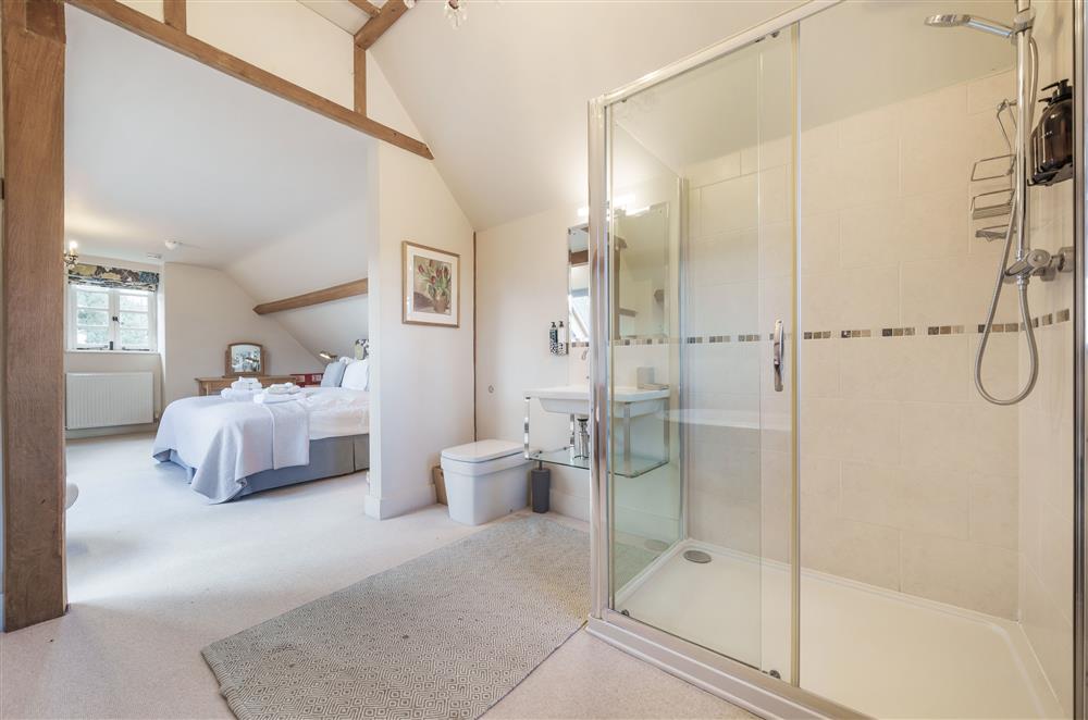 The Loft Room leads onto an en-suite open-plan bathroom (photo 2) at Gate Street Farm House, Bramley, Guildford