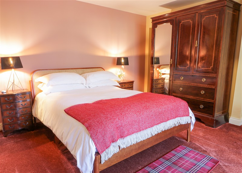 This is a bedroom (photo 3) at Gatehouse 2 Cessnock Castle, Galston