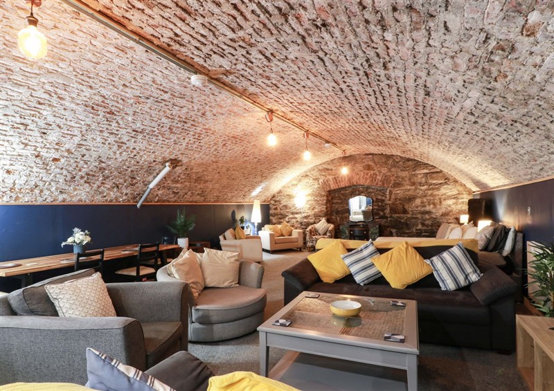 Relax in the living area at Gatehouse Studio Apartment, Gatehouse Of Fleet