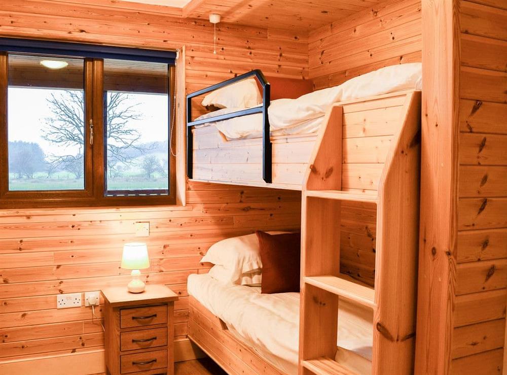 Bedroom with cabin-style bunks at Knock Murton Lodge, 