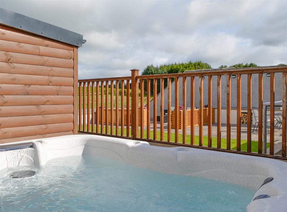 Luxurious hot tub at Knock Murton Lodge, 