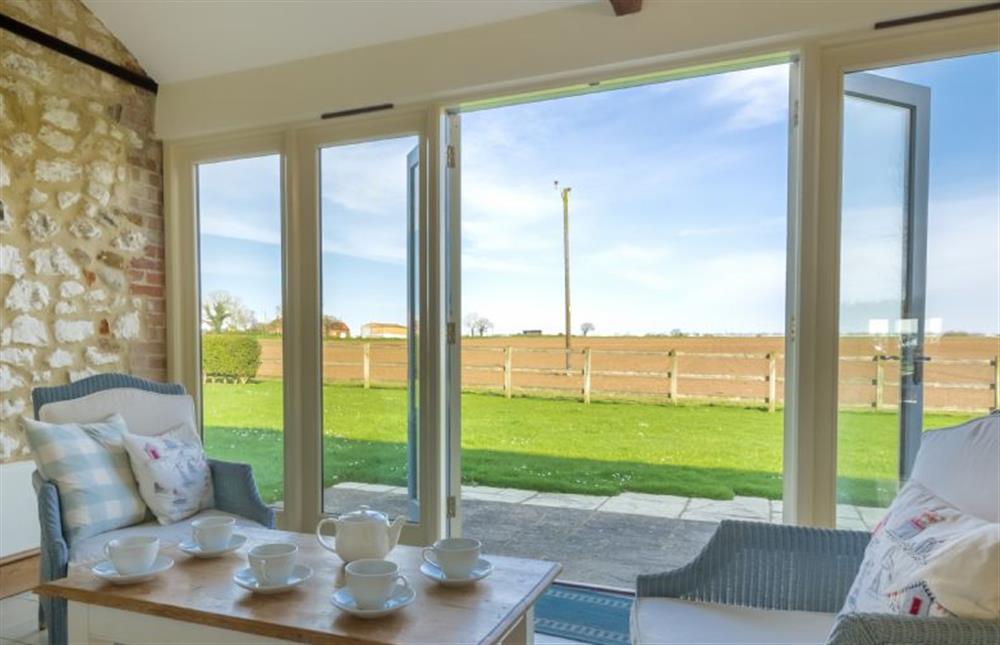 Ground floor: Dining area has lovely views to open countryside at Geddings Farm Barn, Ringstead near Hunstanton