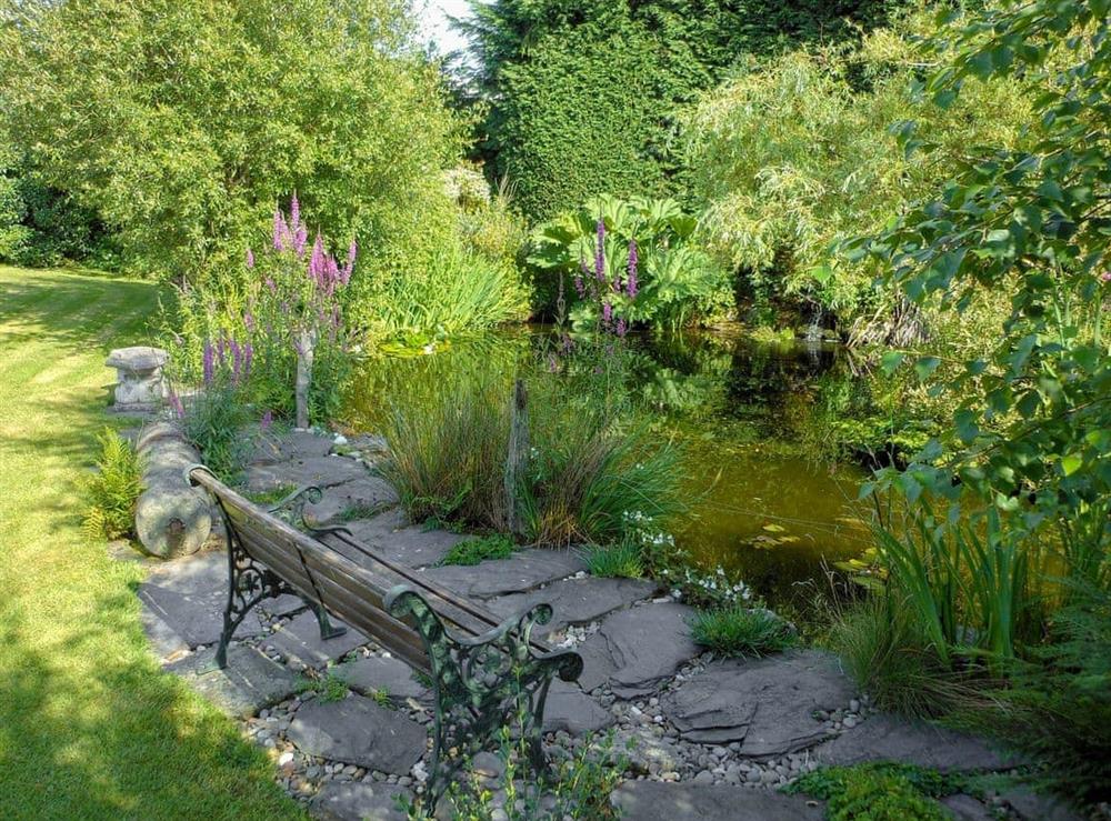 Delightful 1-acre garden (shared) (photo 5) at Gell Cottage in Criccieth, Gwynedd., Great Britain