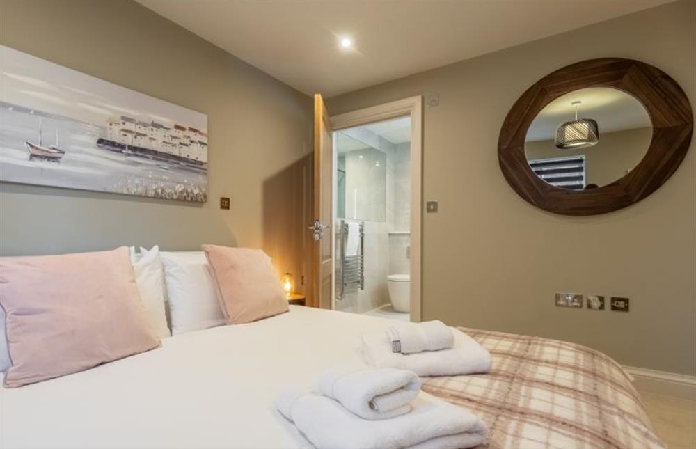 Master bedroom looking to the en-suite at George House, Docking near Kings Lynn