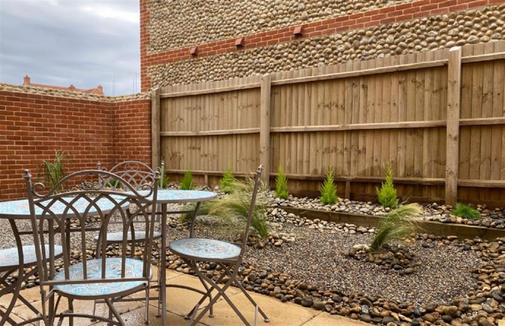 The private, enclosed courtyard garden at George House at George House, Docking near Kings Lynn
