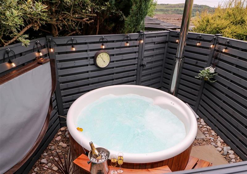 There is a hot tub at Geraldene, Holmfirth