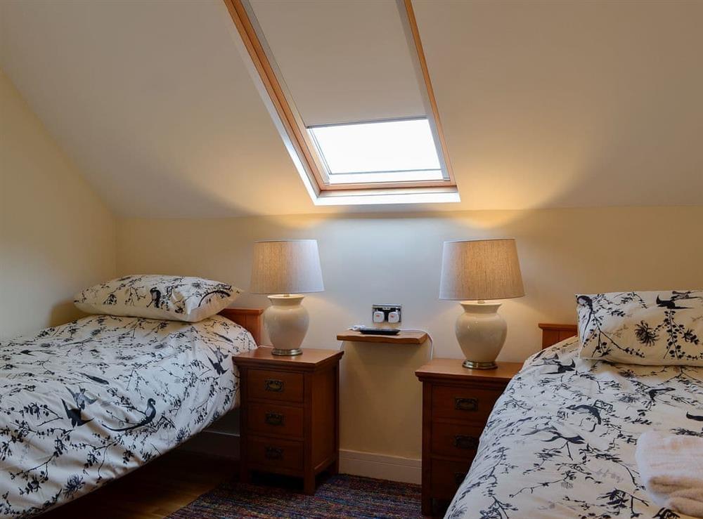 Delightful twin bedroom at Ghillie Cottage in Cockermouth, Cumbria