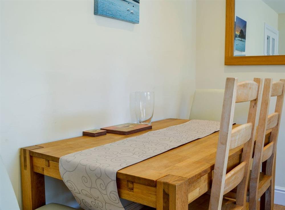 Modest dining area at Ghillie Cottage in Cockermouth, Cumbria