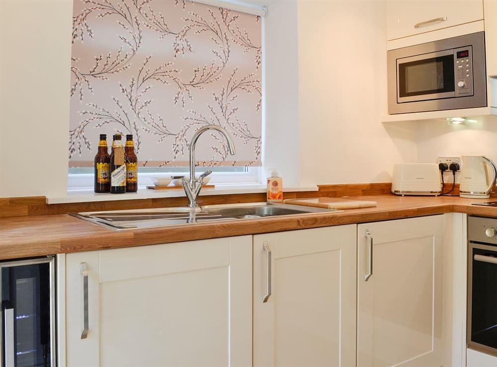 Practical kitchen layout at Ghillie Cottage in Cockermouth, Cumbria