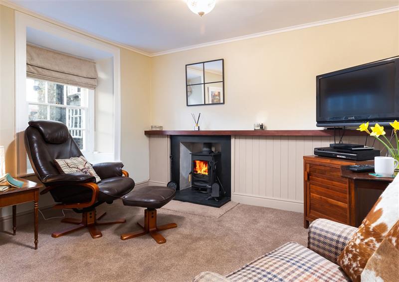 Relax in the living area at Ghyll Foot Cottage, Ambleside