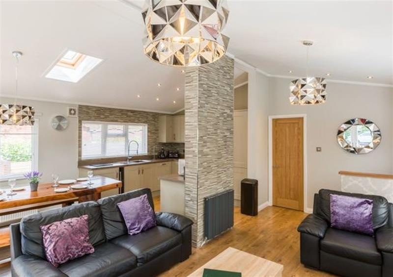 Relax in the living area at Ghyll Lodge, Windermere