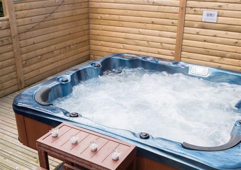 Spend some time in the hot tub at Ghyll Lodge, Windermere