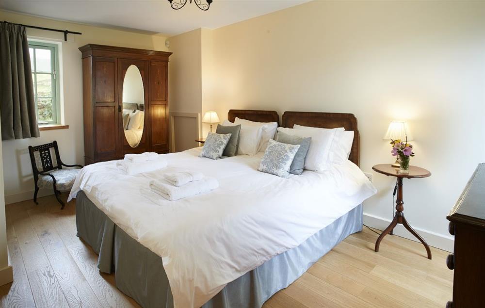 Double bedroom with 5’ bed and en suite shower room (photo 2) at Gill Beck Barn, Melmerby