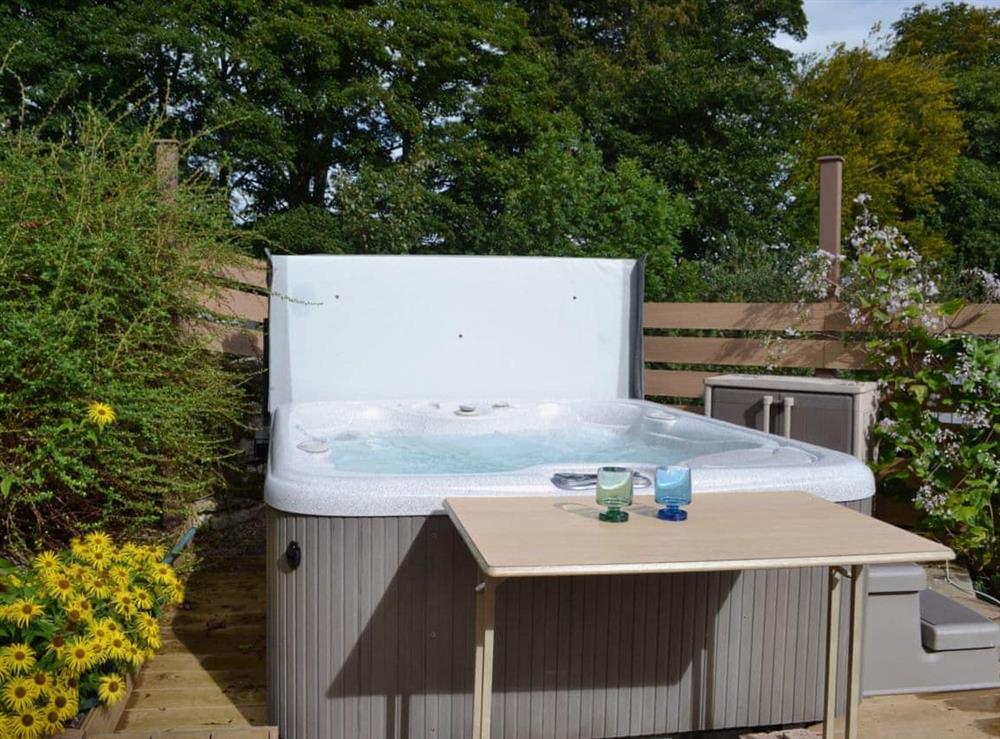 Relax in the private hot tub at Gill Cottage in Crosby Garrett, near Kirkby Stephen, Cumbria