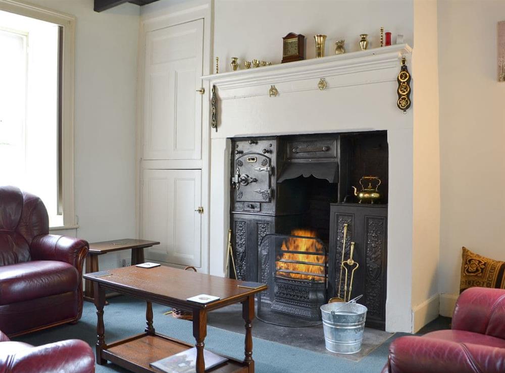 Cosy living room with open fire (photo 2) at Gilmore House in Alston, Cumbria