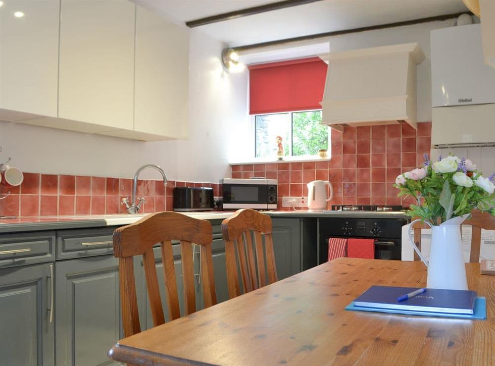 Kitchen with dining area at Gilmore House in Alston, Cumbria
