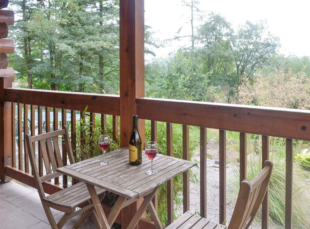 Terrace with outdoor furniture at Gilnockie in Kippford, near Dalbeattie, Kirkcudbrightshire