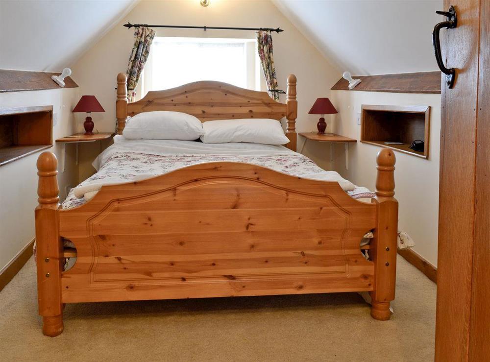 Double bedroom at Gingerbread Cottage in Fairford, Gloucestershire