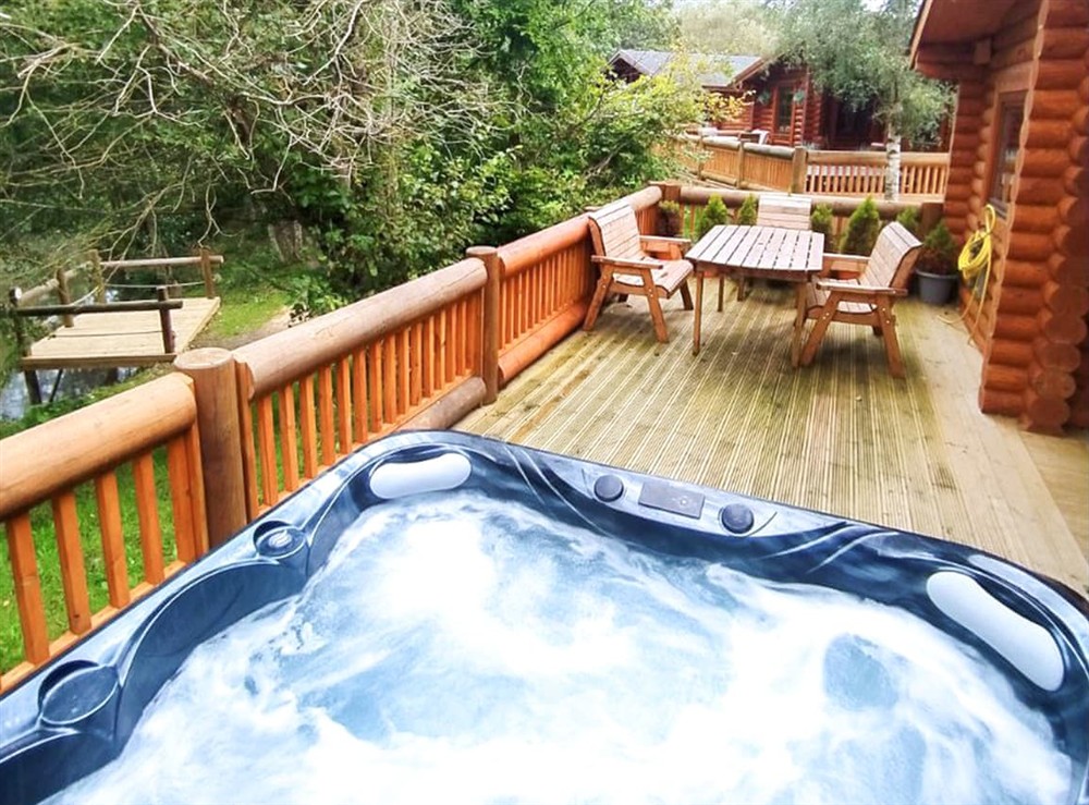 Hot tub at Gingerbread Log Cabin in Felton, near Morpeth, Northumberland