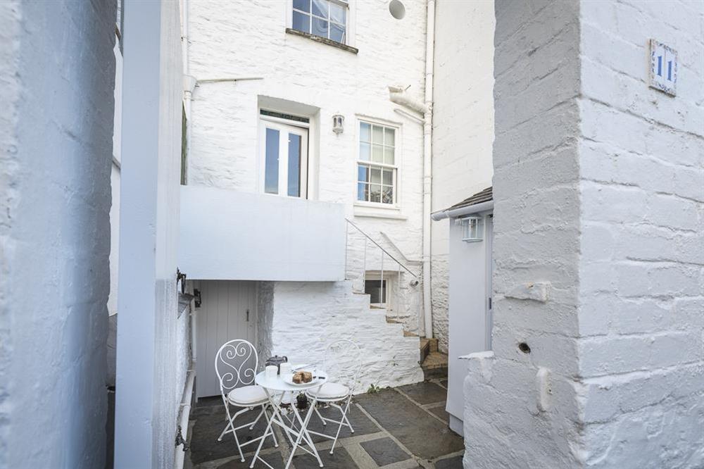Rear courtyard with access to utility room at Ginn Cottage in , Salcombe