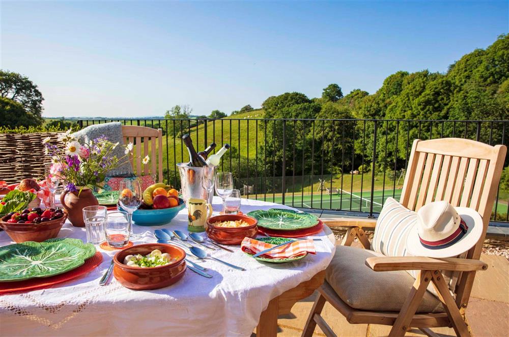 Enjoy alfresco dining and views of the luxurious estate at Gitcombe House, Dartmouth