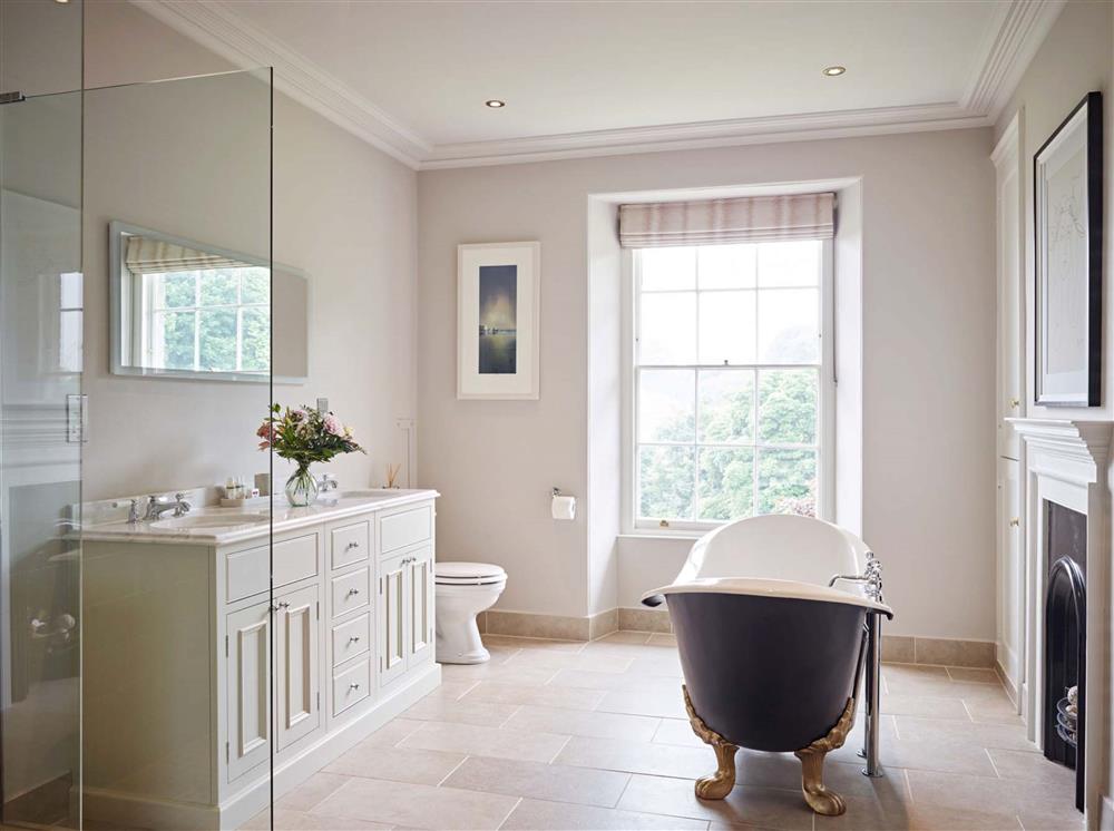 The family bathroom, complete with a cast iron slipper bath  at Gitcombe House, Dartmouth