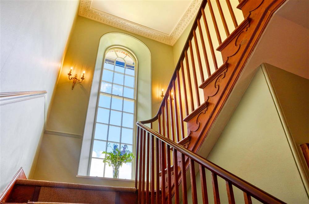 The turned staircase leading to the generous first floor accommodation  at Gitcombe House, Dartmouth