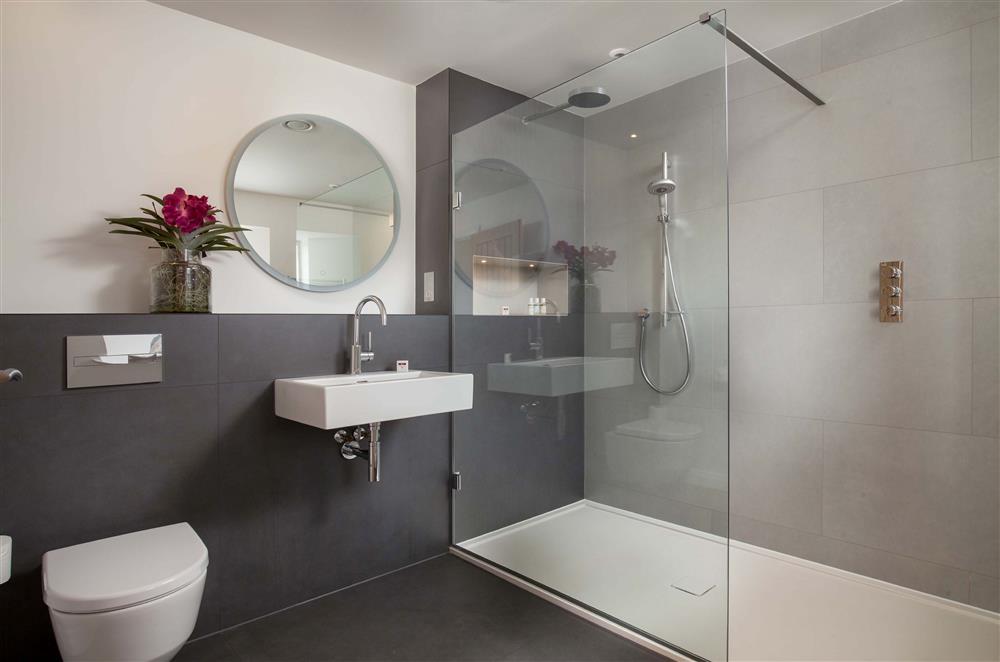 Bedroom four’s en-suite shower room  at Gitcombe Retreat, Dartmouth