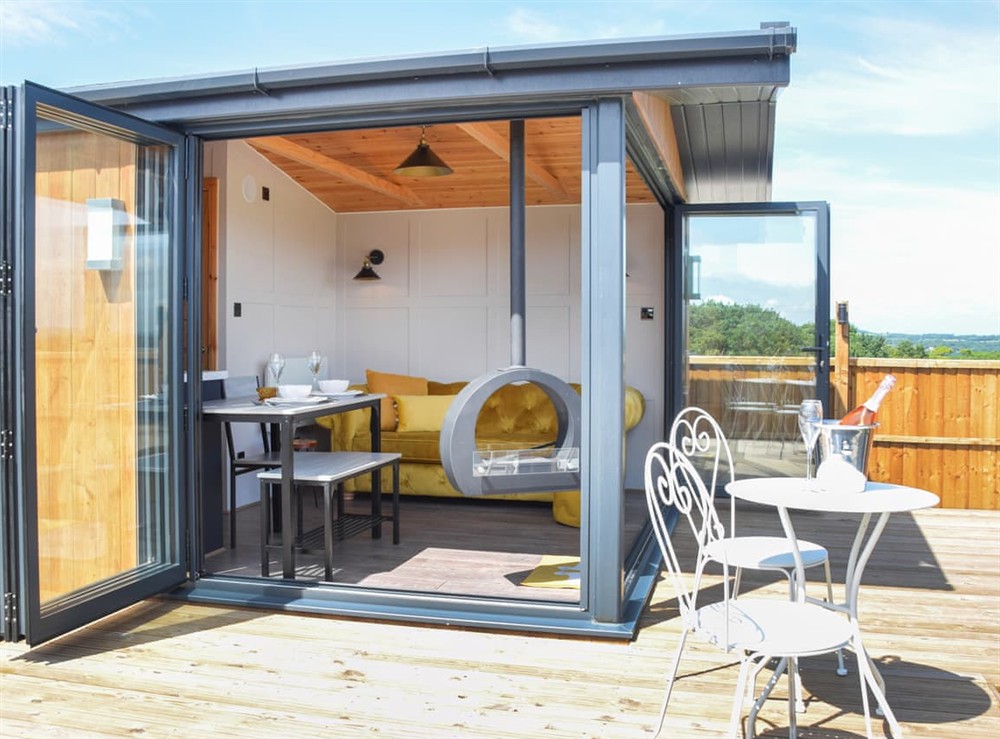 Open plan living space at Glamping Pod 2 in Dalton, near Wigan, Lancashire