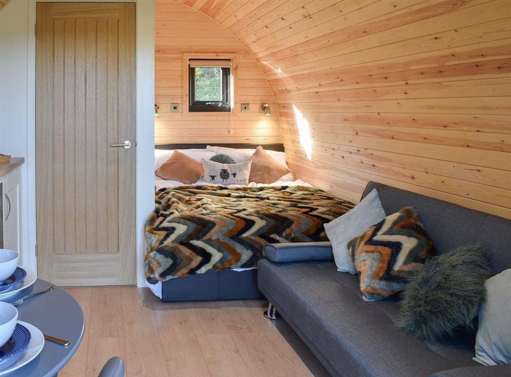 Open plan living space at Glampio Trysor Merddwr in Corwen, near Bala, Gwynedd