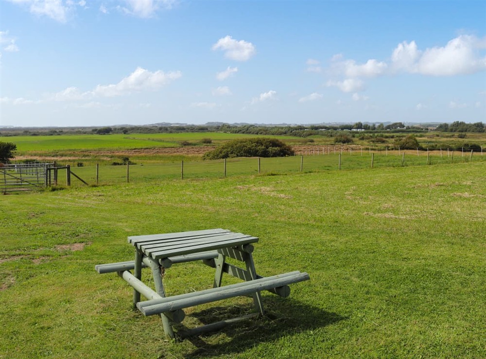 Sitting-out-area at Glan Tywyn Shepherds Hut in Bryngwran Nr Rhosneigr, Gwynedd