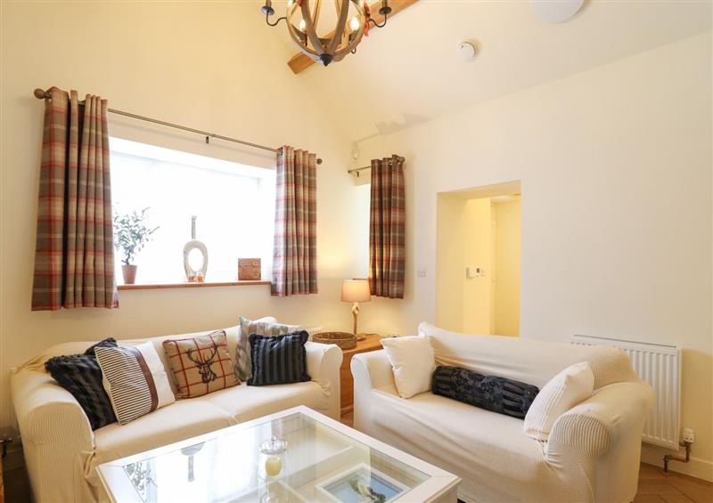 Relax in the living area at Glan Y Mor Lodge, Y Felinheli