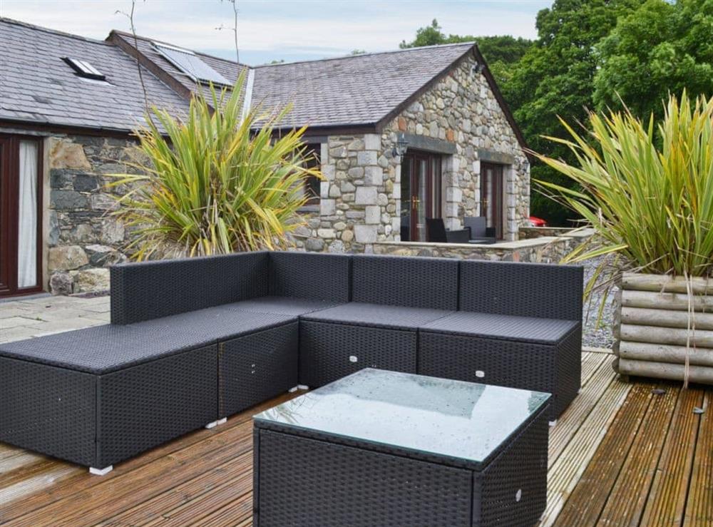 Spacious patio with furniture at Glanrafon Isaf in Llanfaglan, Caernarfon, Gwynedd., Great Britain