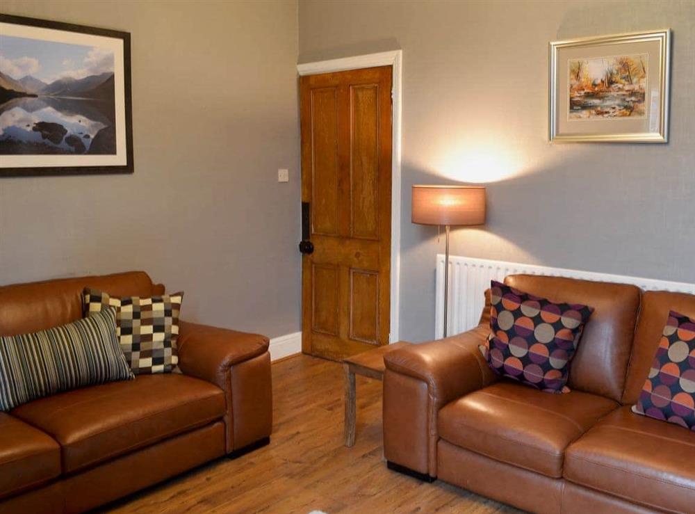 Attractive living room with wood burner (photo 2) at Glaramara in Kendal, Cumbria, England
