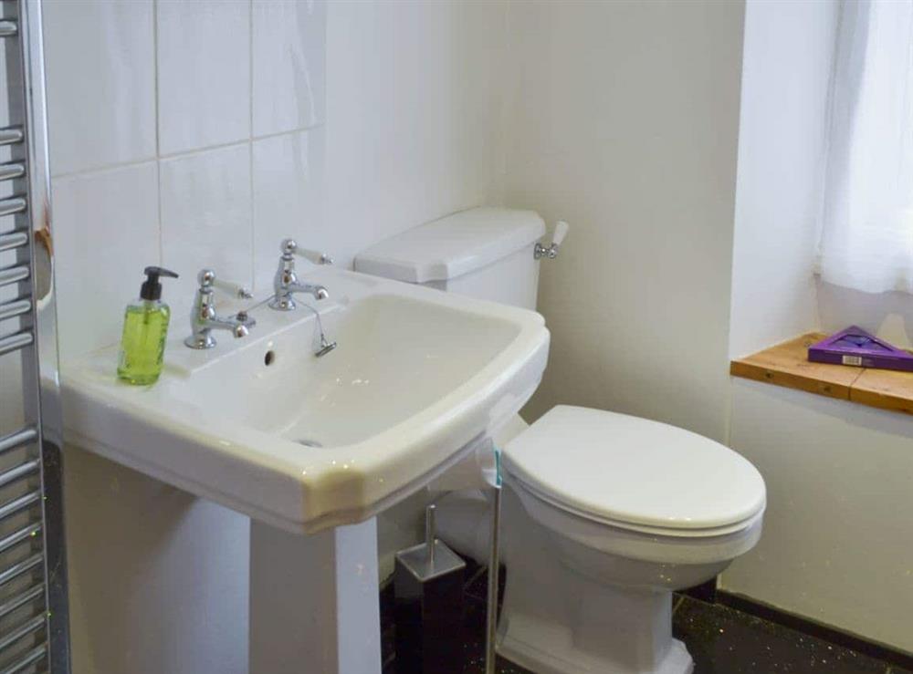 Bathroom with claw foot bath and shower attachment (photo 2) at Glaramara in Kendal, Cumbria, England