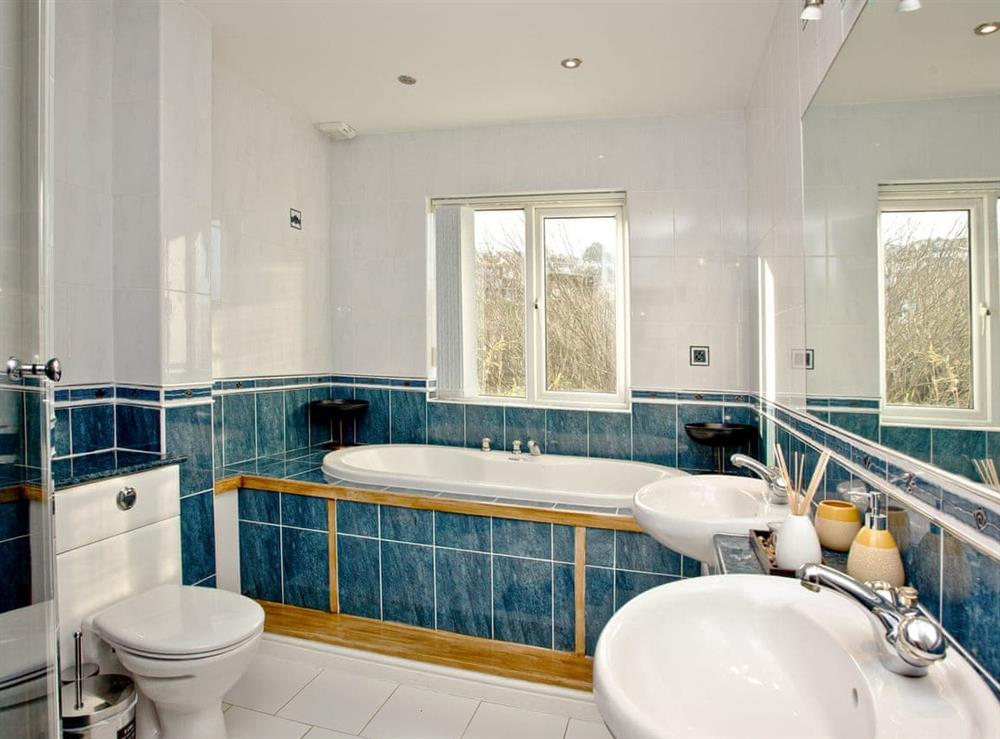 Bathroom with jacuzzi bath, walk-in shower, steam room at Glas Mordros in Carbis Bay, Cornwall