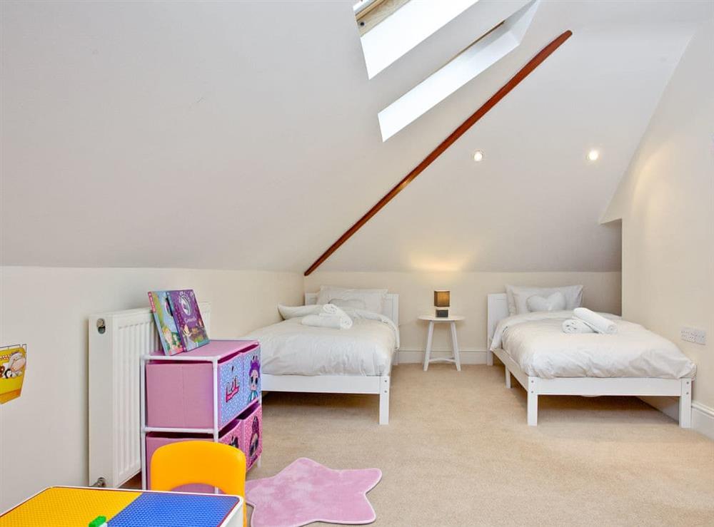 Triple bedrooms with three single beds (photo 3) at Glas Mordros in Carbis Bay, Cornwall