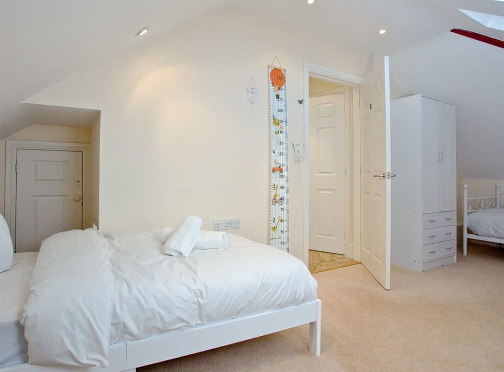 Triple bedrooms with three single beds at Glas Mordros in Carbis Bay, Cornwall