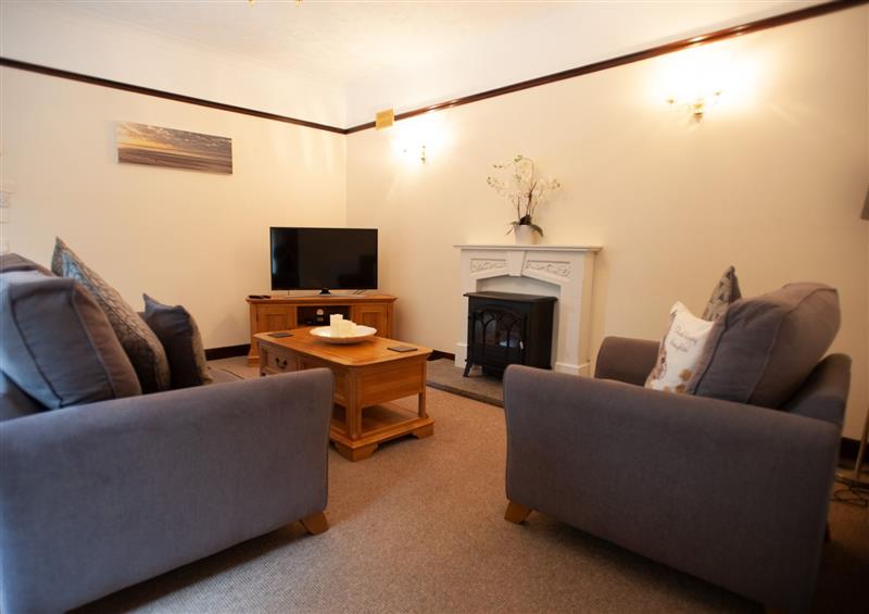 Enjoy the living room at Glasinfryn Cottage, Llanbedrgoch near Benllech