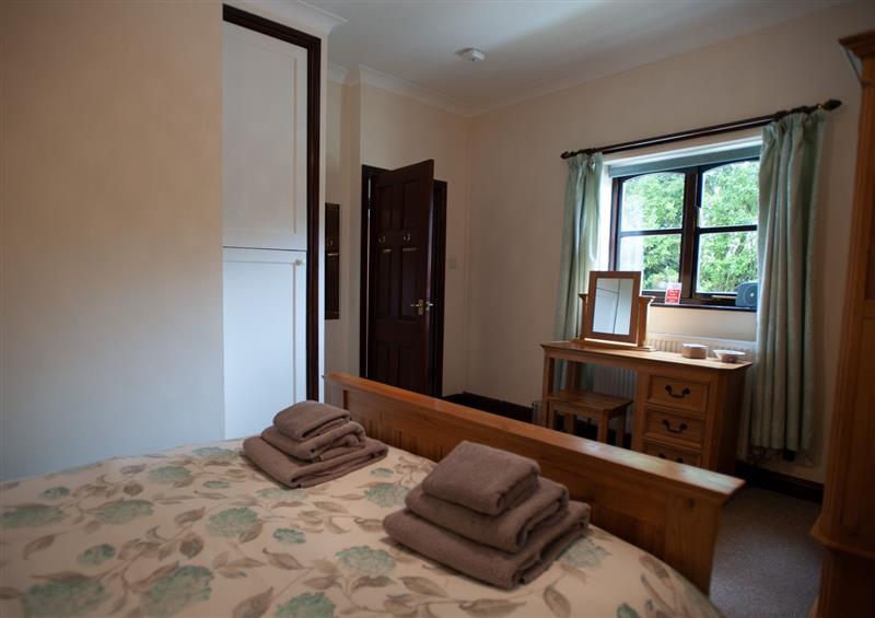 This is a bedroom at Glasinfryn Cottage, Llanbedrgoch near Benllech