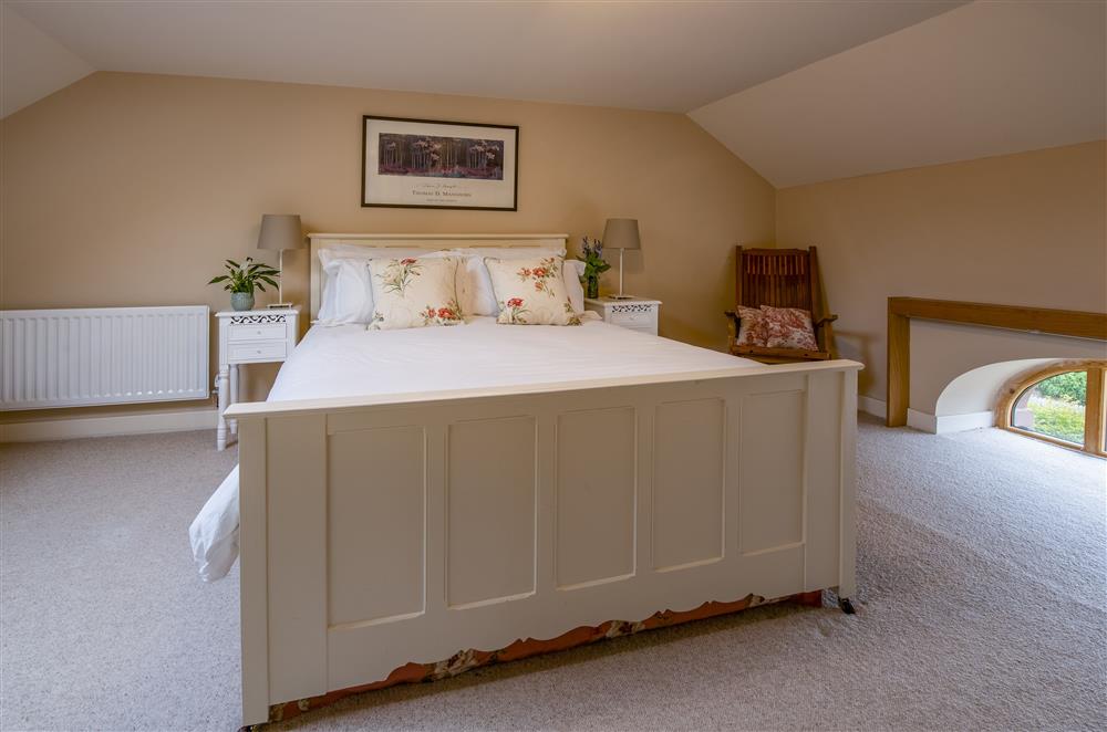 Beautiful bedroom one with a 5’ antique oak carved bed and en-suite bathroom at Glassonby Old Hall and Jennys Croft, Glassonby