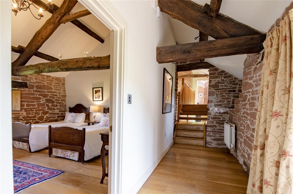 Bedroom four leading to the galleried landing at Glassonby Old Hall and Jennys Croft, Glassonby