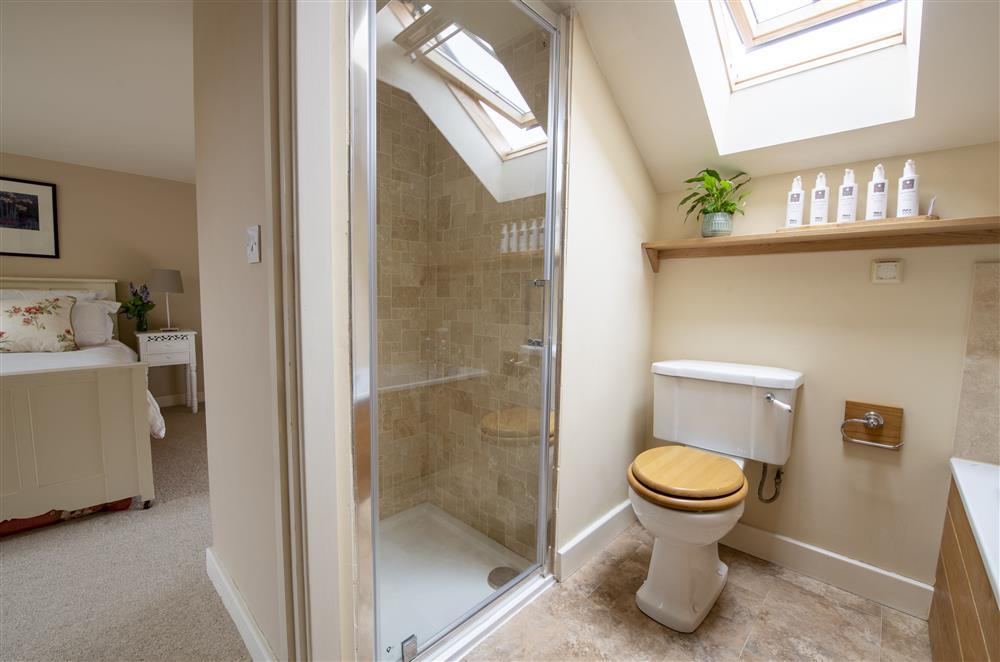 Bedroom one’s en-suite bathroom with walk-in shower at Glassonby Old Hall and Jennys Croft, Glassonby
